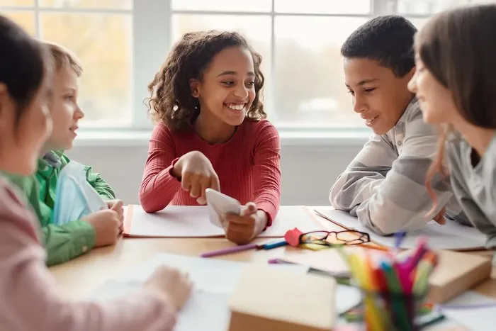 Child doing a school activity with materials