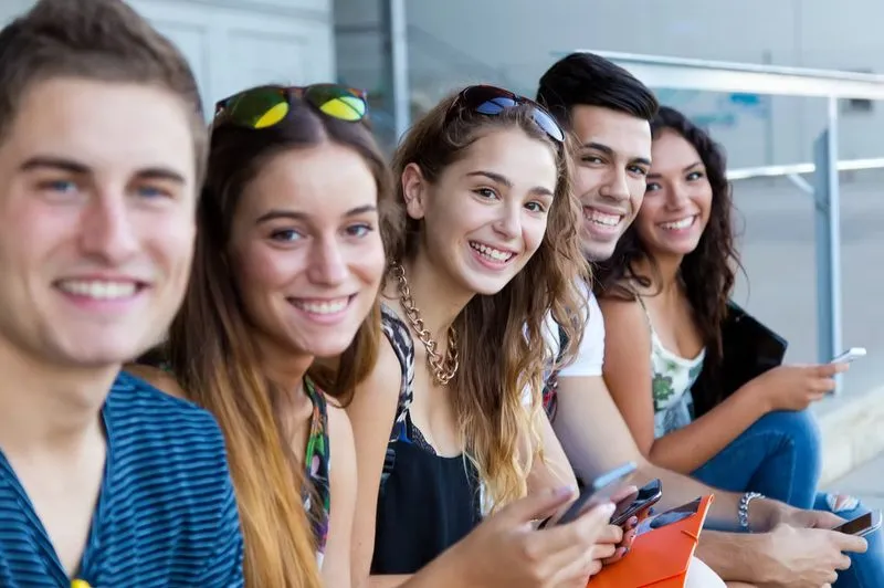 Teens aged 15 to 18 smiling